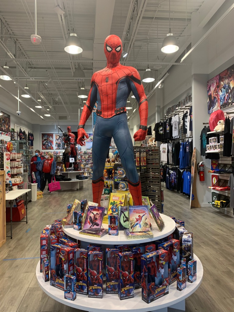 Shoppers check out the merchandise at Adventureland Store in Blackwood, NJ while Spiderman continues to greet guests by the entrance. November 3, 2020, Photo/ Julia Riffle.